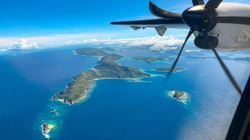 View out of the window of a El Nido Flight - Flying from Manila