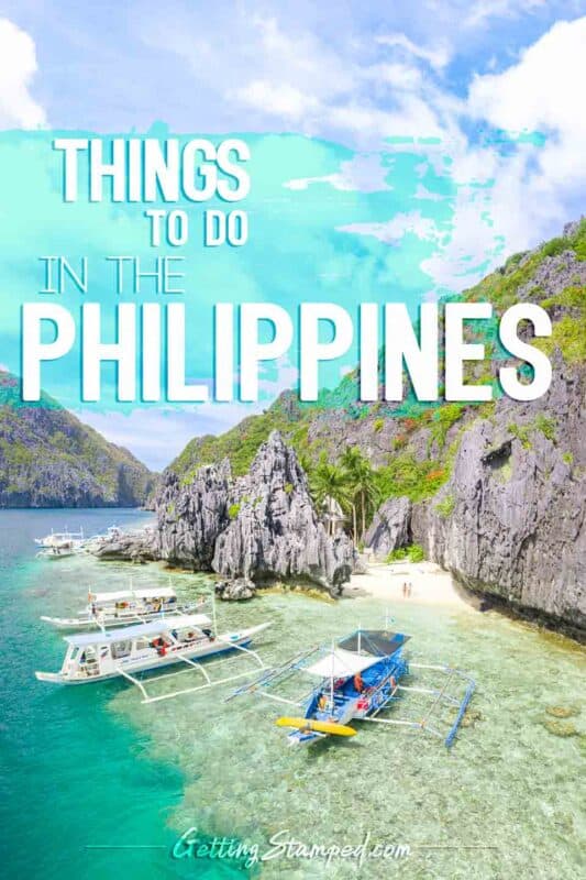 Boats parked in front of an Island in the Philippines - Pinterest Pin for best things to do