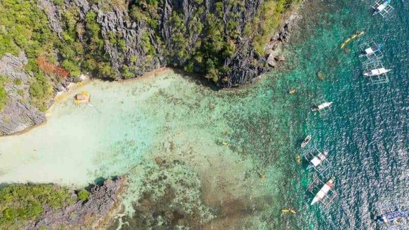 Shallow entrance of the Lagoon with boats parked outside