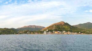 a view of Mount Tapyas from a boat coming into Coron port