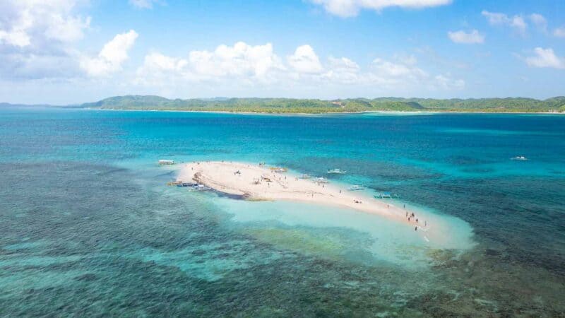 Drone photo of Naked Island with near by islands in the back ground - siargao