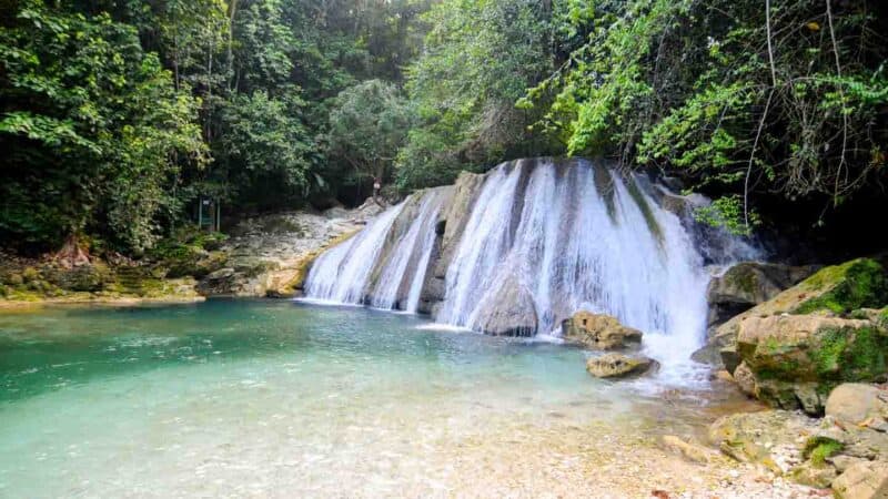 View of the waterfalls and pool at Reach Falls in Jamaica