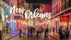 Long Exposure photo of Bourbon Street at Night with text over "Things to do New Orleans"
