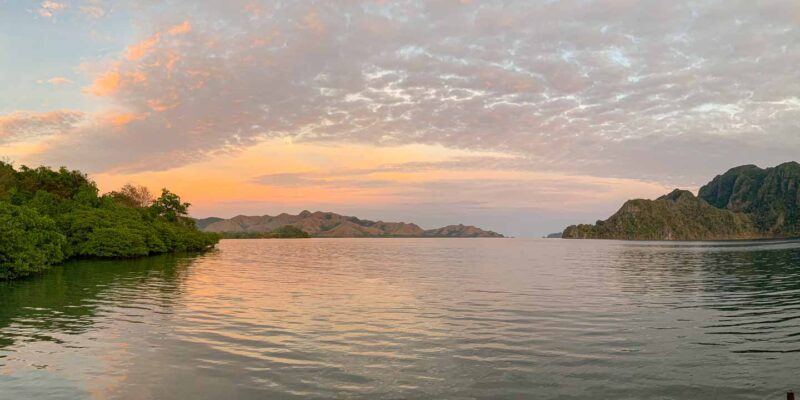 View of the bay at sunset as seen from Maquinit