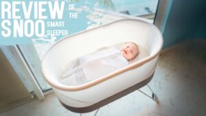 Baby laying in the Snoo Smart Sleeper Bassinet - Featured image for review article