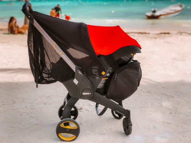 Doona Stroller on the beach