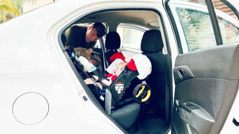 baby in the Doona car seat in car without base