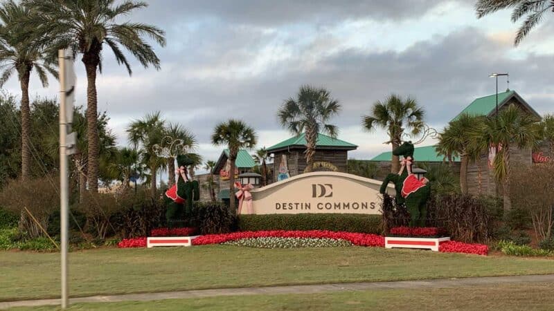 View of the Desin Commons sign and retail building