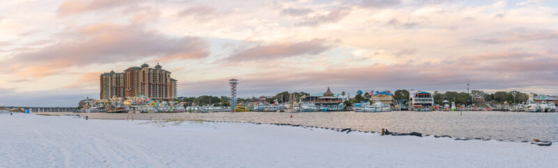 a panoramic view of the Destin Harbor Walk Village at sunset