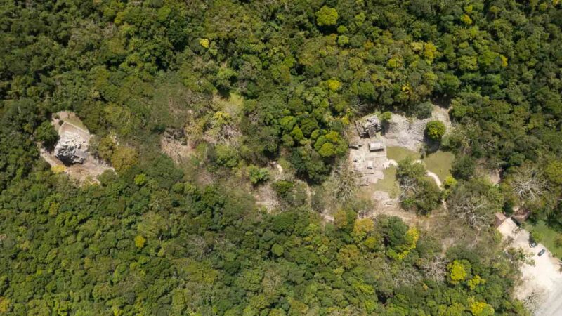 Overall top down drone photo of Muyil mayan ruins site