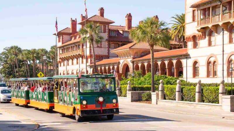 green and orange hop on hop off trolley of St. Augustine - Top actives