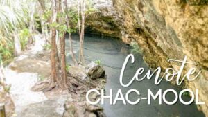 view at the surface of Cenote Chac-Mool with white text over - featured image