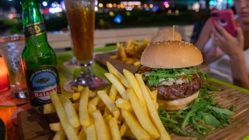 Plate of Burgers and fries at Dushi Burgers and Bagels in Aruba