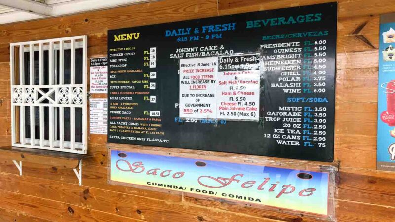 View of the menu posted on the exterior of Saco Felipe - Best Restaurants in Aruba