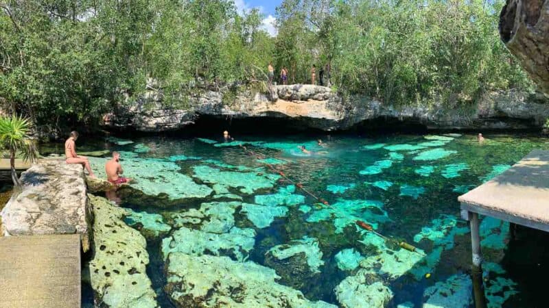 cliff jumping at cenote Azul - "Blue Cenote"