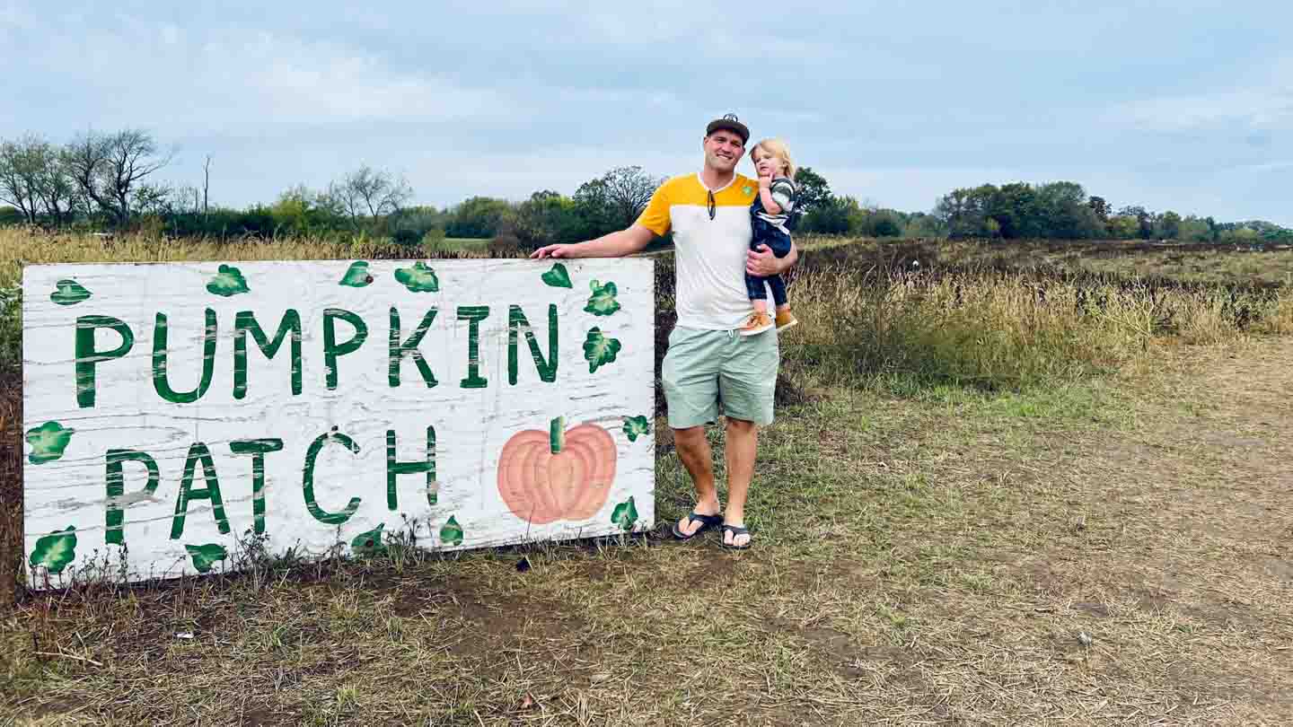 Pumpkin patch in Wisconsin sign dad & son