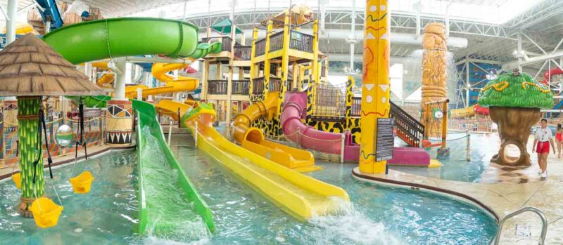 group of colorful water slides at the indoor water park of the Kalahari resort