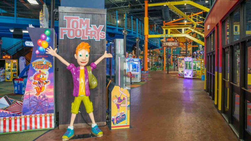 Entrance and red haired Mascot of Tom Foolery's Adventure Theme Park at the Kalahari Resort