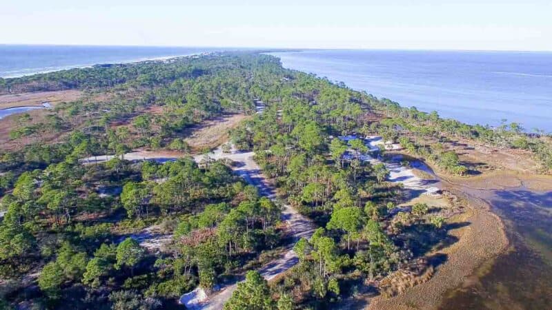 aerial view of Fort de Soto State Park with shorelines and beaches and palm covered landscapes - Places to visit in St. Pete FL