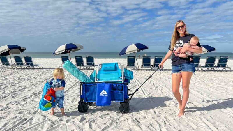 Woman and children on the beach with baby rental gear from Babyquip in St. Petersburg Florida