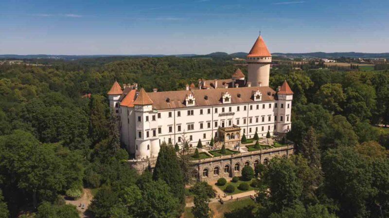 Aerial view of Konopiste Castle in the hilly forests of the Czech Republic