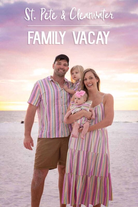 family of four at sunset on st petersburg beach on vacation wearing pink striped outfits