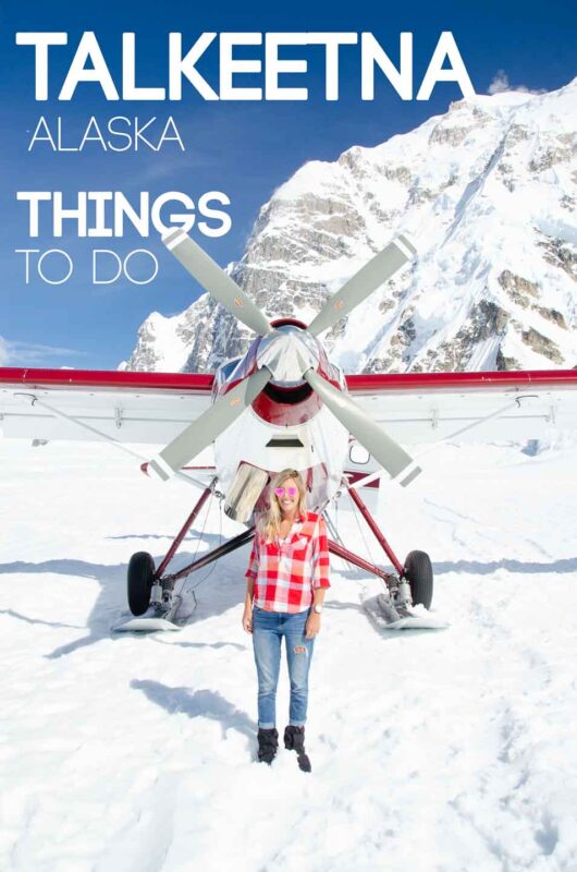 woman standing in front of a glacier landing plane on top of Denali - Top things to do in Talkeetna