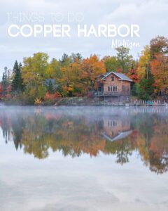 cabin on the lake in fall with colorful leaves - pin with text over "Things to do in Copper Harbor Michigan"