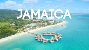 Wide view of Sandals South Coast resort for a featured image for Sandals Resorts in Jamaica with white text over