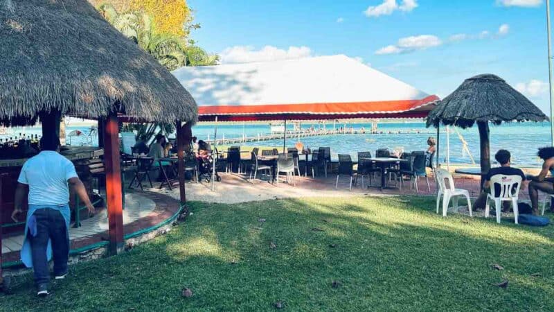 view of the exertior of Kai Pez Restaurant on the shore of Laguna Bacalar