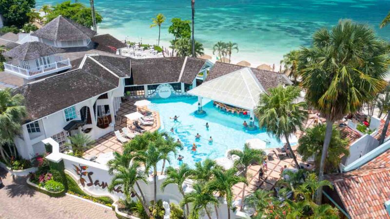 Drone photo of Sandals Negril Main pool and swim up bar in front of the beach
