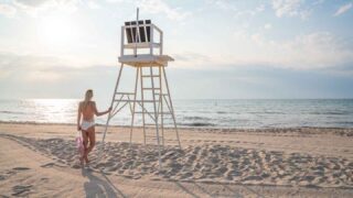 Milwaukee Beach lifeguard stand with girl