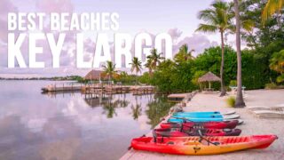 Sunrise over one of the best beaches in Key Largo with kayaks in the sand - featured image with white text