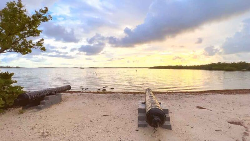 view of the black cannons on Cannon Beach in Key Largo at sunrise