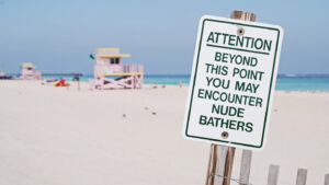 clothing optional sign florida beach