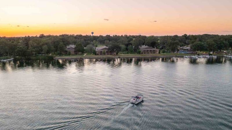 pontoon boat Rental in Lake Geneva - sunset cruise with orange and pink skies