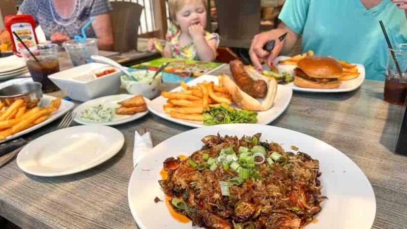 table full of food at Next Door Pub in Lake Geneva Wisconsin - top rated restaurants