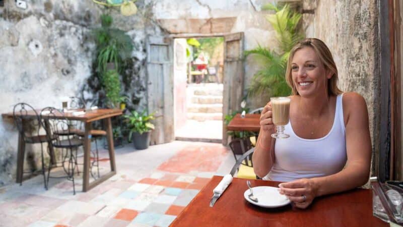 woman eating at Los Arcos restaurant in Izamal Mexico