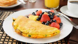 Omelete and berries breakfast restaurant