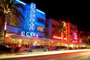 Beautiful Art Deco district and hotels in Miami illuminated in neon