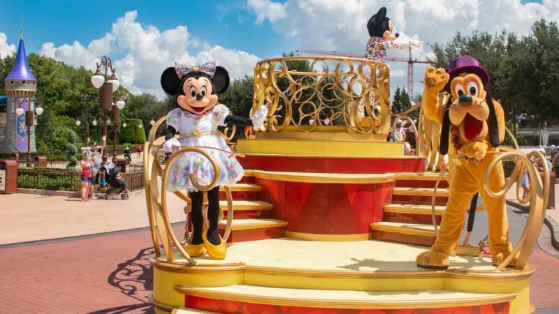 Micky Mouse Minne Mouse Pluto on float at Disney World in Florida