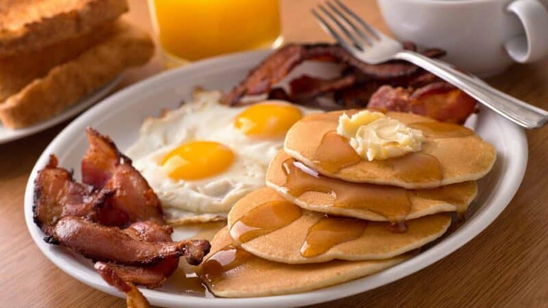 breakfast platter bacon eggs pancakes restaurant food