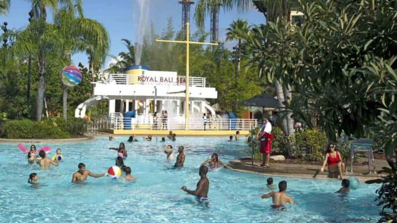 kids playing in the pool at Loews Royal Pacific waterpark pool in Orlando