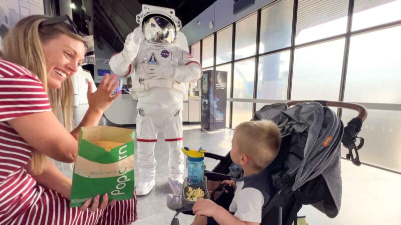 family meeting an astronut at the Keneddy space Center