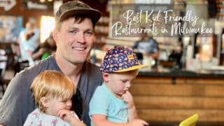 Dad and two toddlers on his lap at a restaurant in Milwaukee