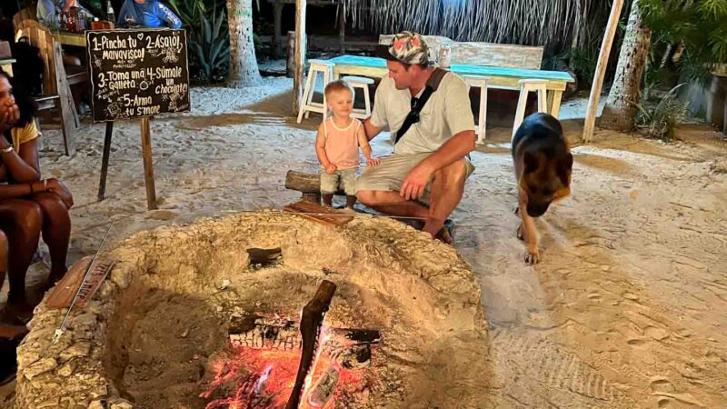 Father and son at a fire in Mexico