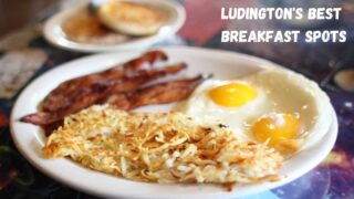 eggs, bacon, and hash browns on a plate with text best breakfast in Ludington