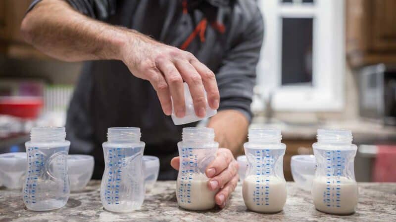 measuring out bottles on the counter