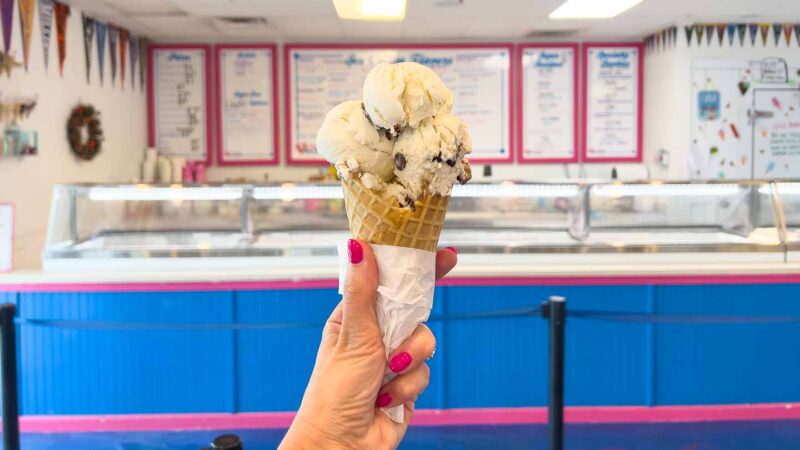 Woman holding an ice cream cone at Love Boat Ice Cream in Fort Myers FL