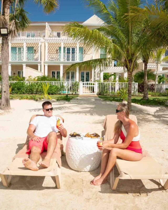 couple eating on the beach at Beaches Negril Resort in Jamaica